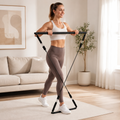 Using the multi-grip pilates bar kit for a full-body workout
